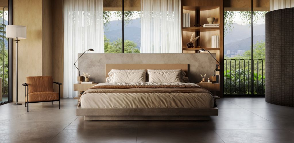 23living A cozy bedroom featuring a large bed and a window allowing natural light to enter the space.