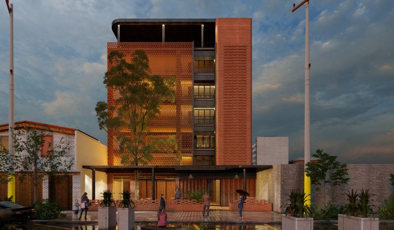 gres living es ese edificio de ladrillo con un árbol frente a él, creando un ambiente acogedor y natural