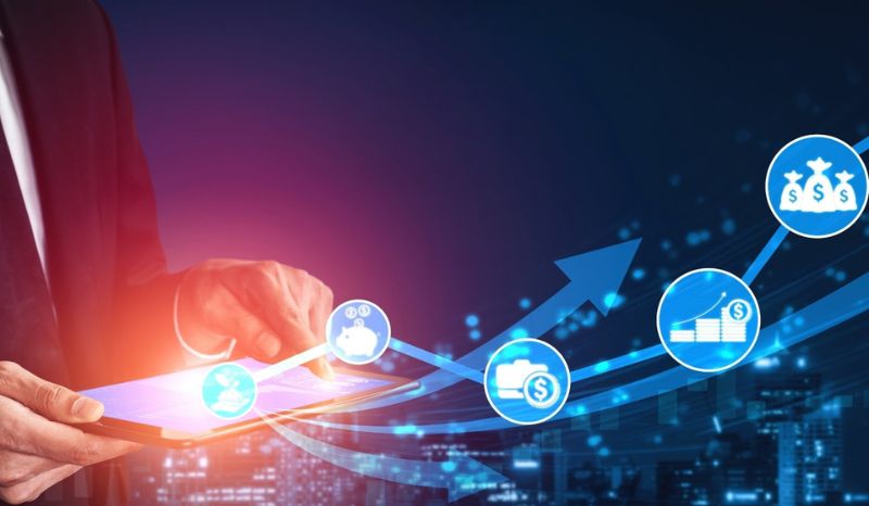 Businessman interacting with a tablet, observing a business model.